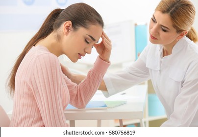 Young Depressed Woman At Doctor's Office