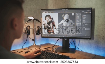 Young designer creates 3D model of game character using PC. Interface of professional 3D modeling software. Teenage boy working on freelance project on computer at home. Game development concept.