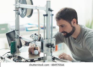 Young Designer Engineer Using A 3D Printer In The Laboratory And Studying A Product Prototype, Technology And Innovation Concept