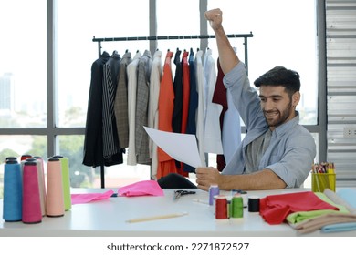 Young designer with his design, Fashion design concept. - Shutterstock ID 2271872527