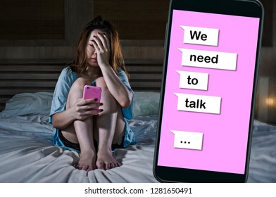 Young Desperate And Sad Girl Feeling Depressed Crying In Bed Suffering Pain And Broken Heart Composite With Mobile Phone Online Text In Relationship Problem And Break Up Concept