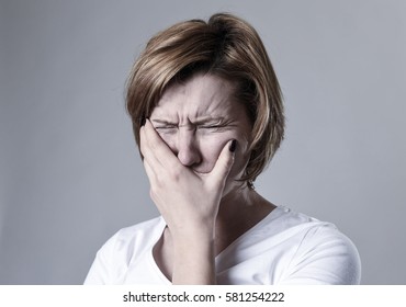 Young Devastated Depressed Woman Crying Sad Feeling Hurt Suffering Depression In Sadness Emotion Gesturing Helpless In Pain Face Expression Isolated Background Desperate