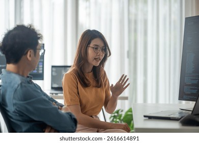 Young developers explore AI solutions, efficiently collaborating in modern offices to enhance digital applications and interfaces.

