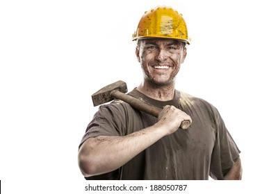 Young Dirty Worker Man With Hard Hat Helmet  Holding A Hammer Isolated On White Background