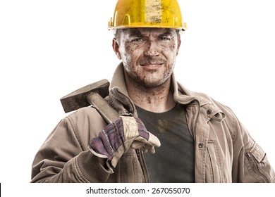 Young Dirty Worker Man With Hard Hat Helmet  Holding A Hammer And Smiling Isolated On White Background