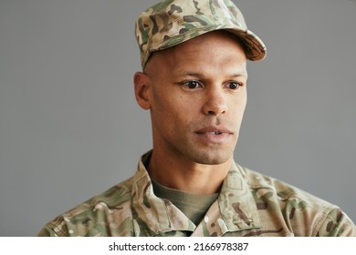 Young Distraught African American Veteran Thinking Of Something.