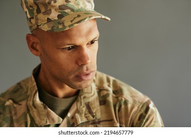 Young Distraught African American Veteran Thinking Of Something.