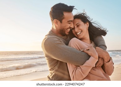 Young diverse biracial couple having fun at the beach together. Young diverse biracial couple having fun at the beach together. - Powered by Shutterstock