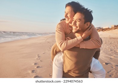 Young diverse biracial couple having fun at the beach together. Young diverse biracial couple having fun at the beach together. - Powered by Shutterstock