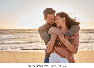 Young diverse biracial couple having fun at the beach together. Young diverse biracial couple having fun at the beach together. - Shutterstock ID 2294074775
