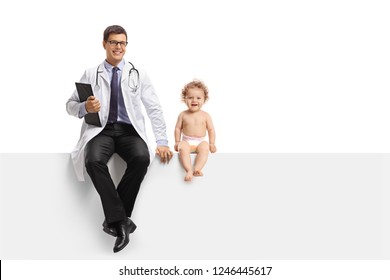 Young Doctor And A Baby Boy Sitting On A Panel Isolated On White Background