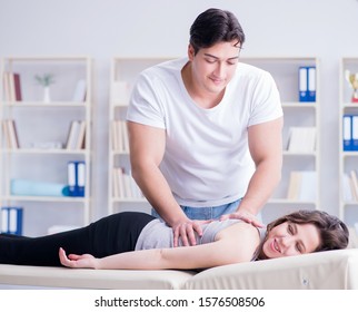 Young Doctor Chiropractor Massaging Female Patient Stock Photo (Edit ...