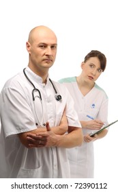 Young doctor dictating notes to the nurse