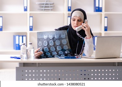 Young Doctor In Hijab Working In The Clinic 