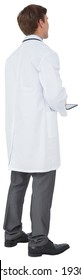 Young Doctor In Lab Coat Using Tablet Pc On White Background