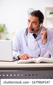 Young Doctor Listening To Patient During Telemedicine Session