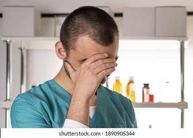 Young Doctor Man In Medical Apparel Facepalm Crying Ashamed. Lifestyle Outdoor Scene