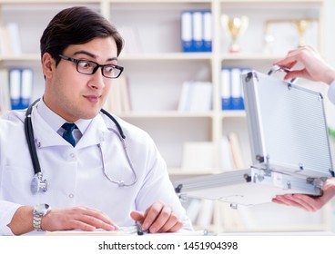 Young Doctor In Medical Insurance Fraud Concept