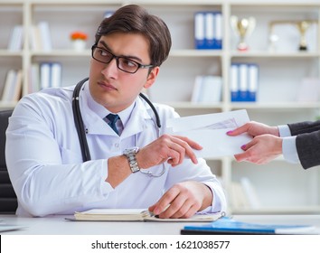 Young Doctor In Medical Insurance Fraud Concept