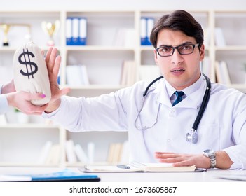 Young Doctor In Medical Insurance Fraud Concept