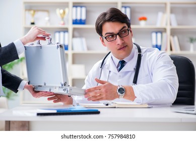 Young Doctor In Medical Insurance Fraud Concept