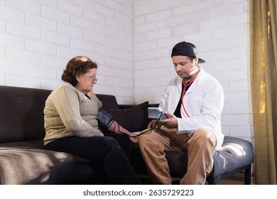 young doctor performs home health care