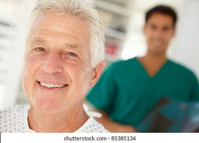 Young doctor with senior patient - Powered by Shutterstock