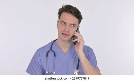 Young Doctor Talking On Phone On White Background