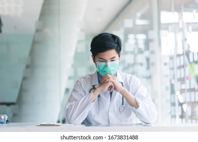 Young Doctor Wearing Stethoscope Stressed With Decision Making And Medicine Concept.