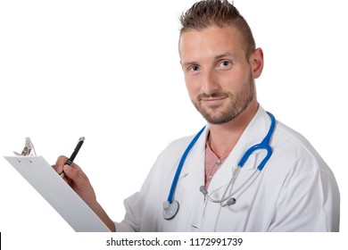 Young Doctor Writing On A Notepad Isolated On White Background