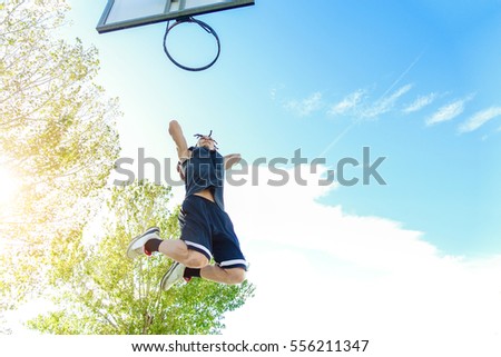 Similar – Image, Stock Photo man playing basketball shadow silhouette in the street