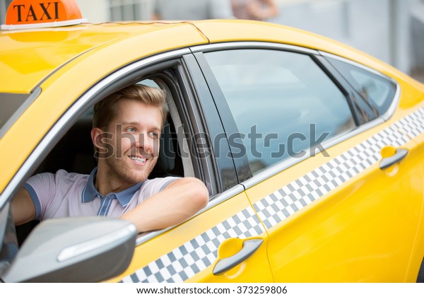 Young driver driving a\
car