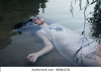 Young drown woman in a poetic representation.