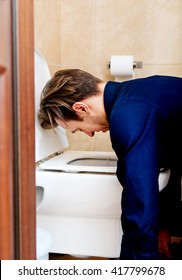 Young Drunk Or Sick Man Vomiting