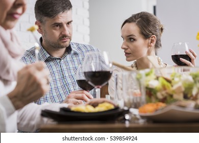 Young Elegant Couple Arguing During Sunday Family Dinner