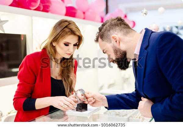 young-elegant-man-buying-wrist-watch-stock-photo-edit-now-1016062735
