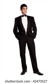 Young Elegant Man In Tuxedo, Studio Shot On White