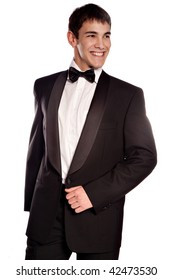 Young Elegant Smiling Man In Tuxedo, Studio On White