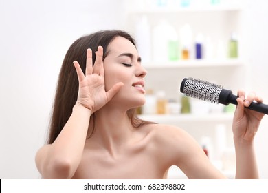 Young Emotional Woman Singing In Bathroom After Shower