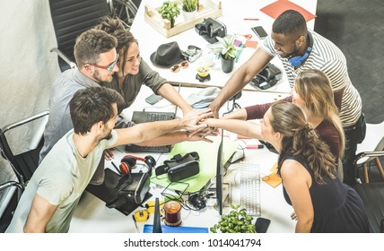 Young Employee Startup Workers Group Stacking Hands At Urban Studio During Entrepreneurship Brainstorming Project - Business Concept Of Human Resources On Working Time - Start Up Internship At Office