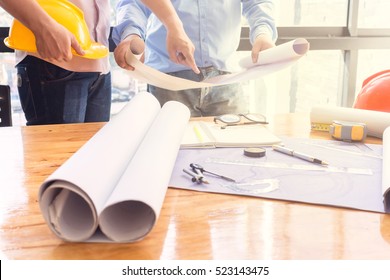 Young engineers working in the office - Shutterstock ID 523143475
