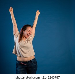 Young Enthusiastic Woman Screaming With Joy. Woman Screaming With Euphoria. Woman Screaming With Joy. Happiness