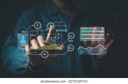 young entrepreneur using big data analysis and cloud technology to collect customer data and display on application dashboard from digital tablet to understand sale forecast and marketing plan.