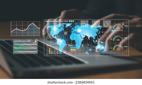 Young entrepreneur using big data analysis and cloud technology to collect customer data and display on application dashboard from digital tablet to understand sale forecast and marketing plan.