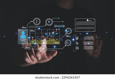 young entrepreneur using big data analysis and cloud technology to collect customer data and display on application dashboard from digital tablet to understand sale forecast and marketing plan.