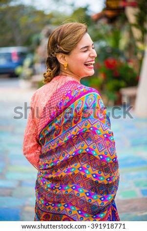 Young ethnic woman laughing