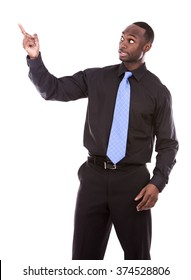 Young Excited Casual Black Man  Pointing Hand On White Background