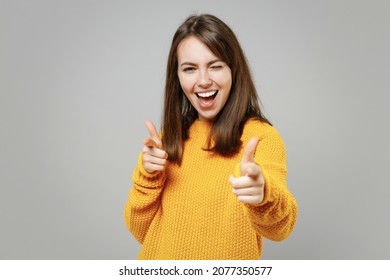 Young Excited Confident Happy Leader Wondered Scared Beautiful Woman Wearing Casual Knitted Yellow Sweater Point Index Finger Camera On You Motivating Isolated On Grey Color Background Studio Portrait