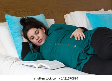 Young Expectant Mom Reading Her Bible In The Morning