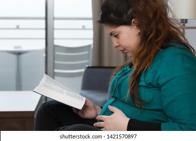 Young Expectant Mom Reading Her Bible In The Morning